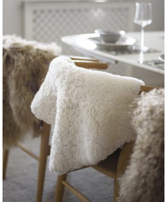 Curly vit - lockigt fårskinn